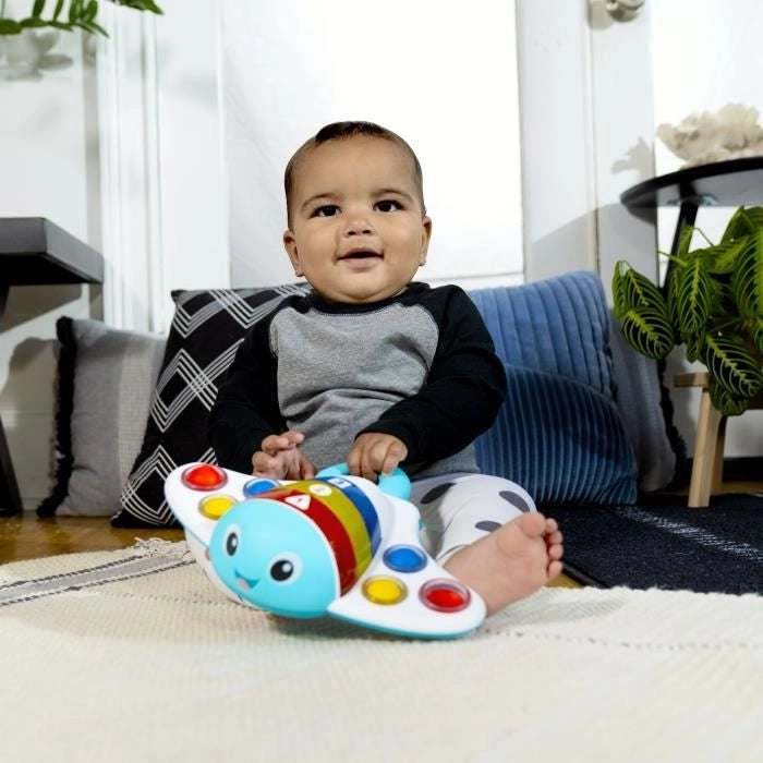 BABY EINSTEIN Ocean Explorers Giocattolo musicale Pop & Explore, 6 pulsanti, 6 mesi