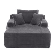 Divano letto compatto con tasche laterali e cuscini in corduroy grigio scuro