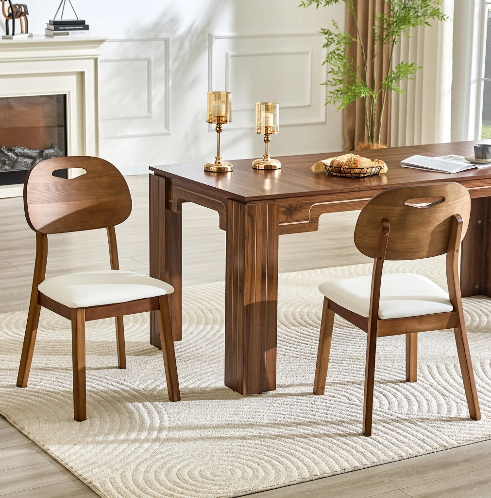 Set di 2 sedie da pranzo 95.5x35.5x54 cm con schienale ovale; seduta imbottita in legno e PU bianco