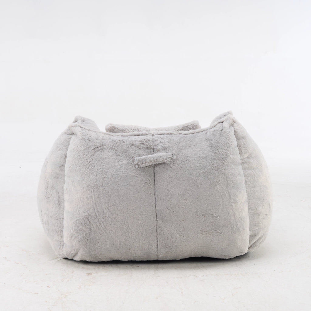 Poltrona pouf con schienale ergonomico e imbottitura in schiuma, in pelliccia sintetica grigia per soggiorno