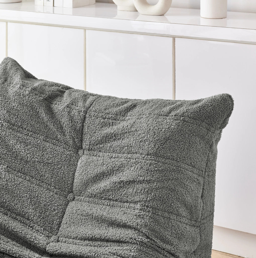 Poltrona relax da pavimento con pouf in teddy grigio