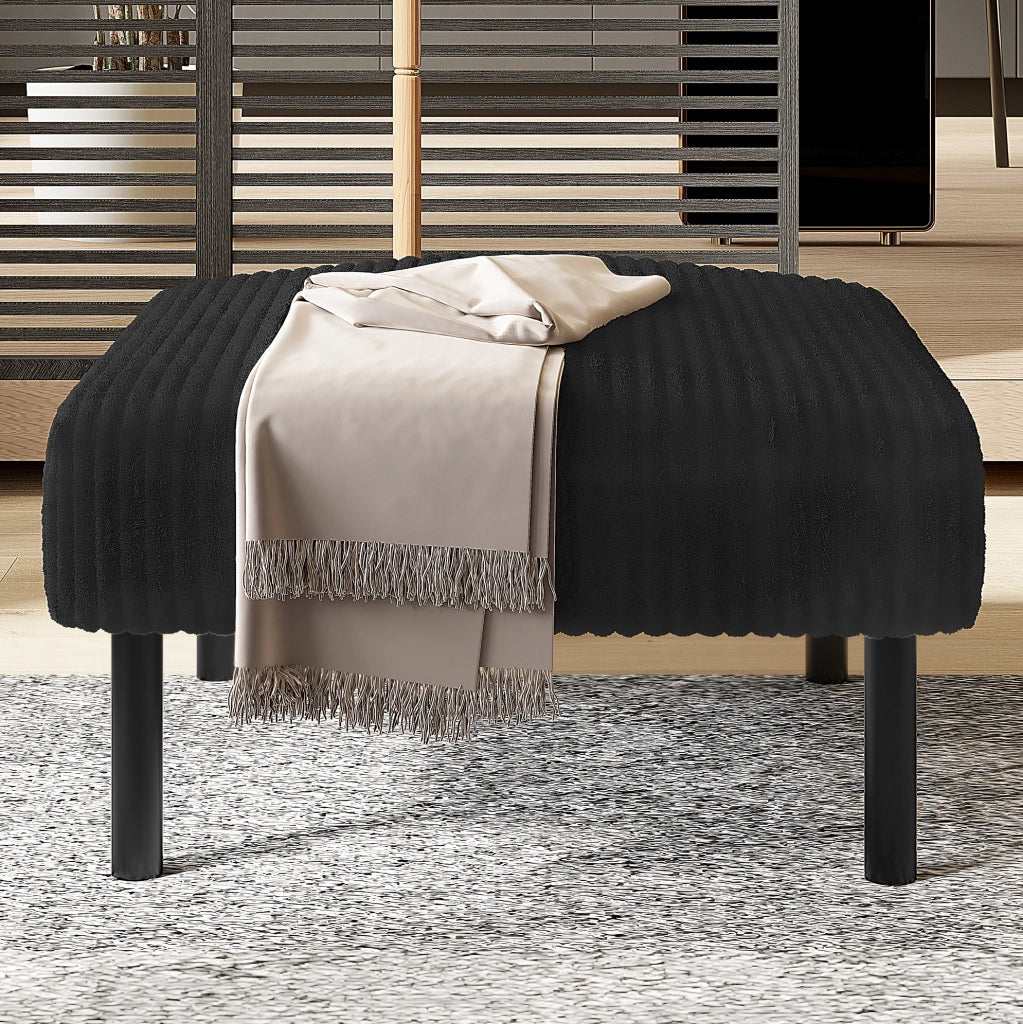 Pouf nero in velluto a coste con struttura in metallo