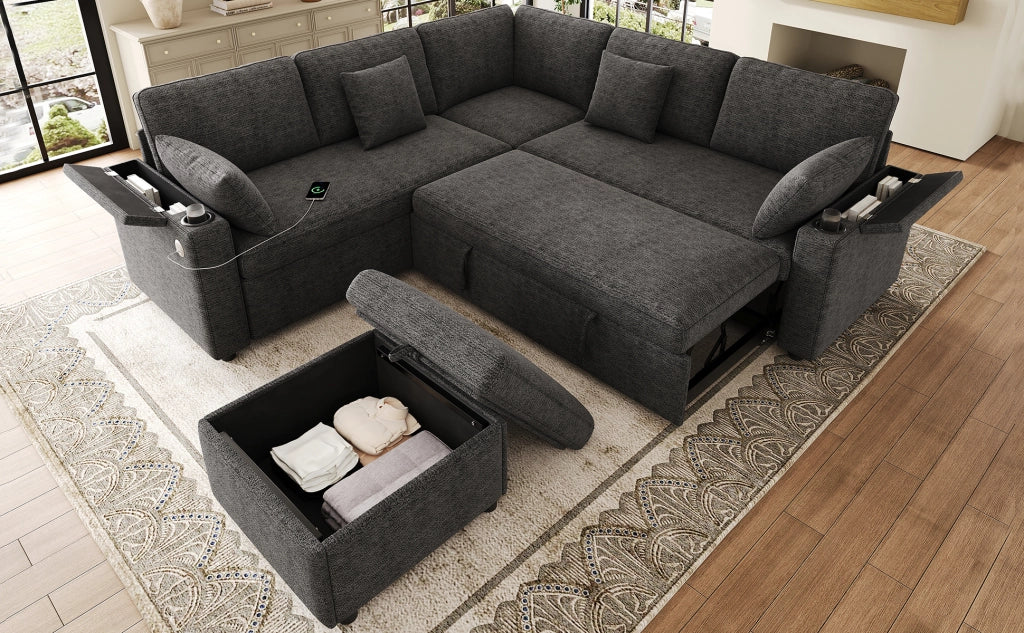 Divano angolare con letto estraibile, pouf mobile, USB e porte bicchieri, contenitori nei braccioli, in ciniglia grigia