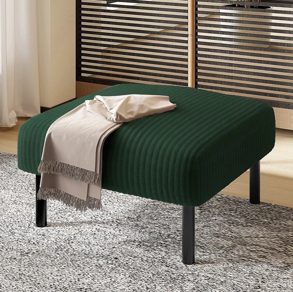 Pouf in velluto a coste verde smeraldo con struttura in metallo