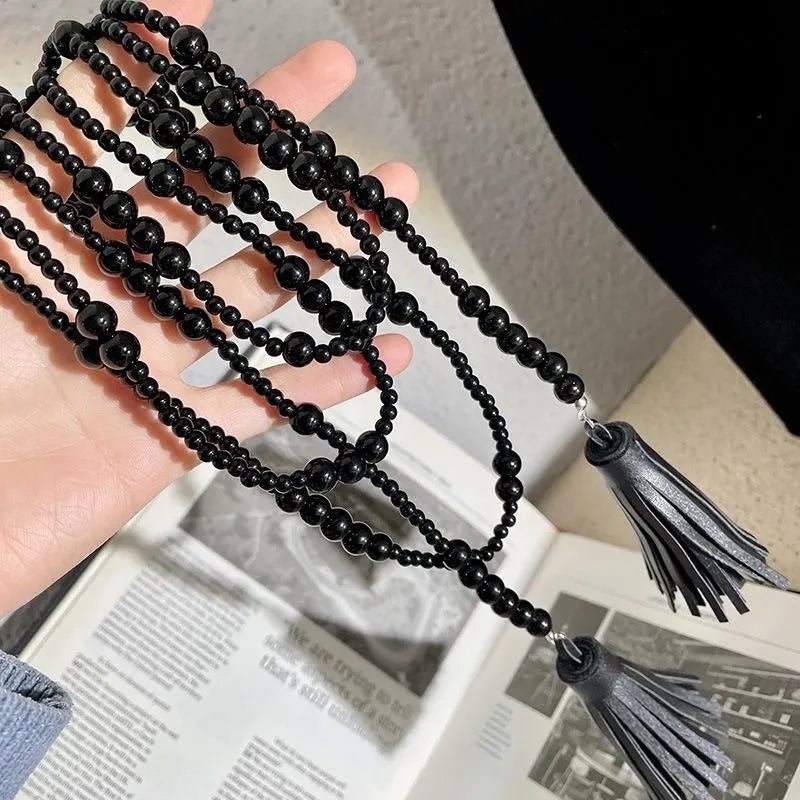 Collana lunga vintage con perline nere e nappa, regalo di Natale o compleanno.