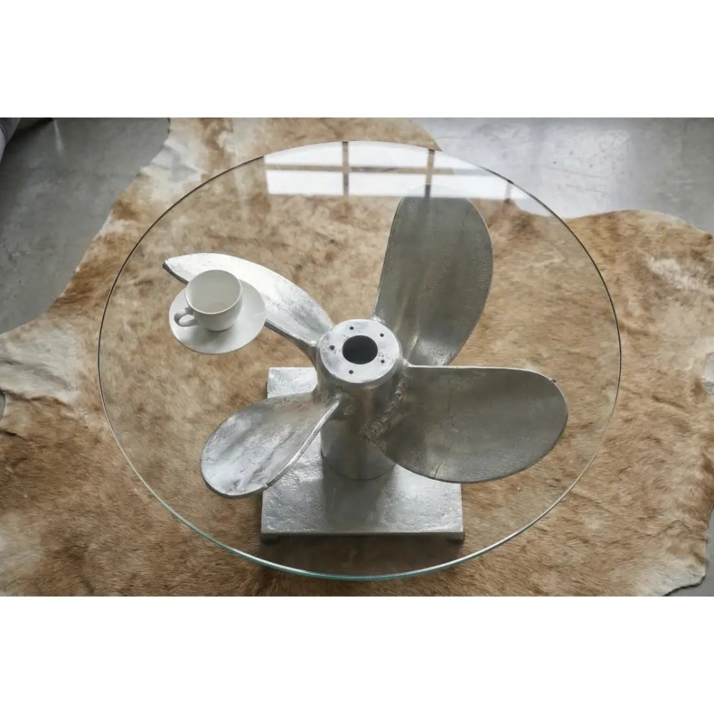 Tavolino basso ALUMIA rotondo 60 cm in alluminio argentato e vetro temperato – design industriale con piede a elica