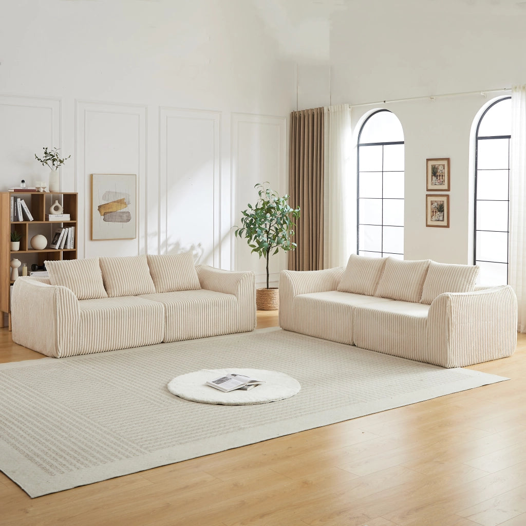 Divano modulare in velluto a coste beige con schienale e braccioli curvi senza montaggio