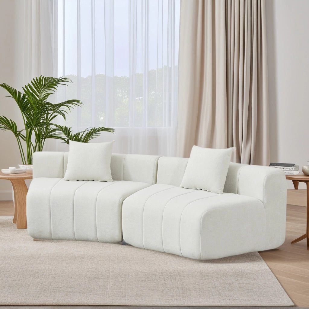 DIVANO Modulare curvo in chenille beige con 2 cuscini