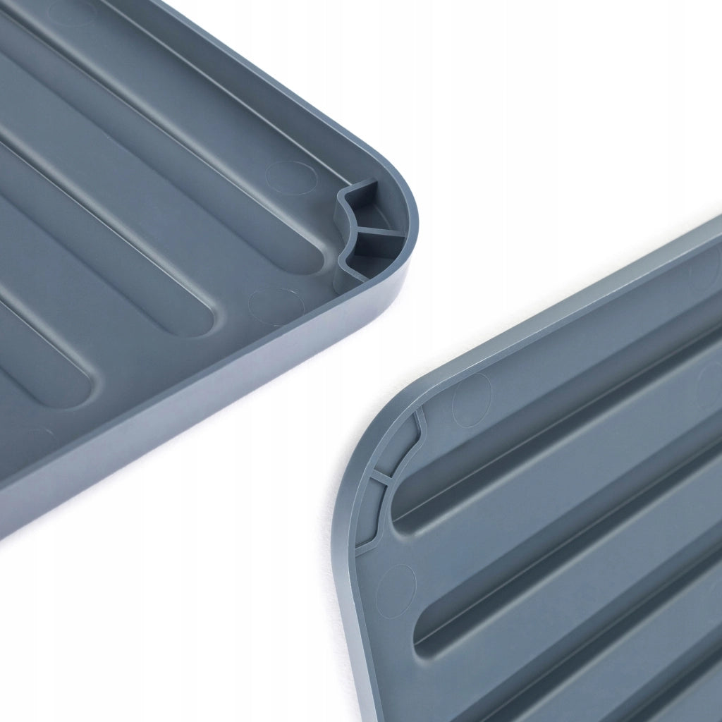 Tappetino scolapiatti in silicone KADAX, colore grigio scuro.