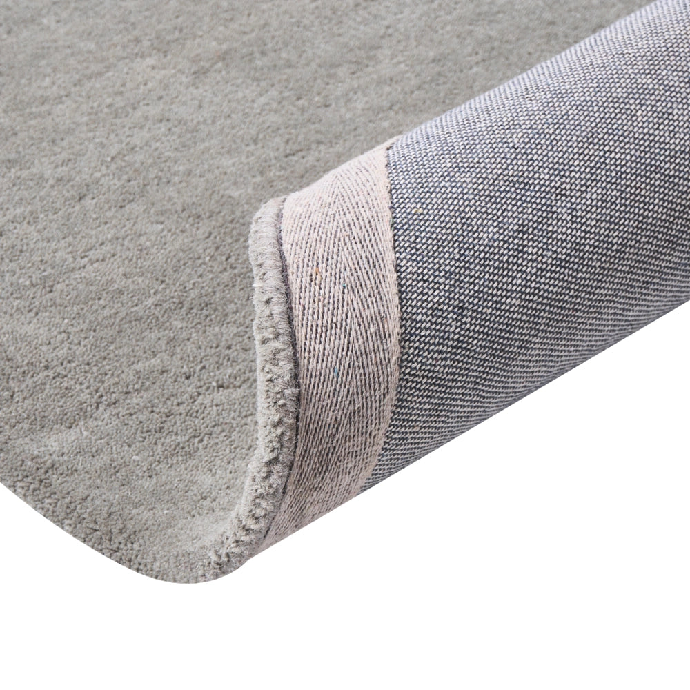 Tappeto in lana grigio scuro 140 cm tuftato a mano rotondo design decorativo