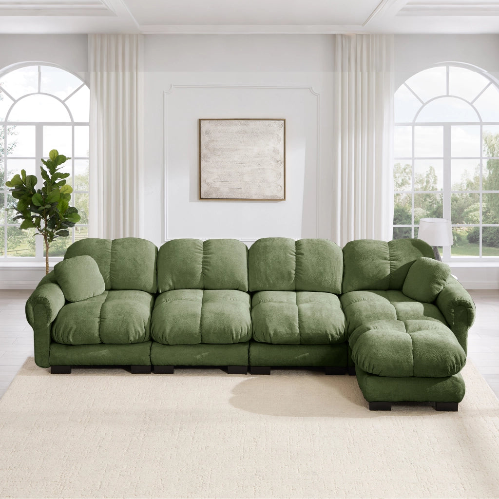 Divano angolare modulare in ciniglia con pouf mobile, cuciture trapuntate e schienale ergonomico verde per soggiorno