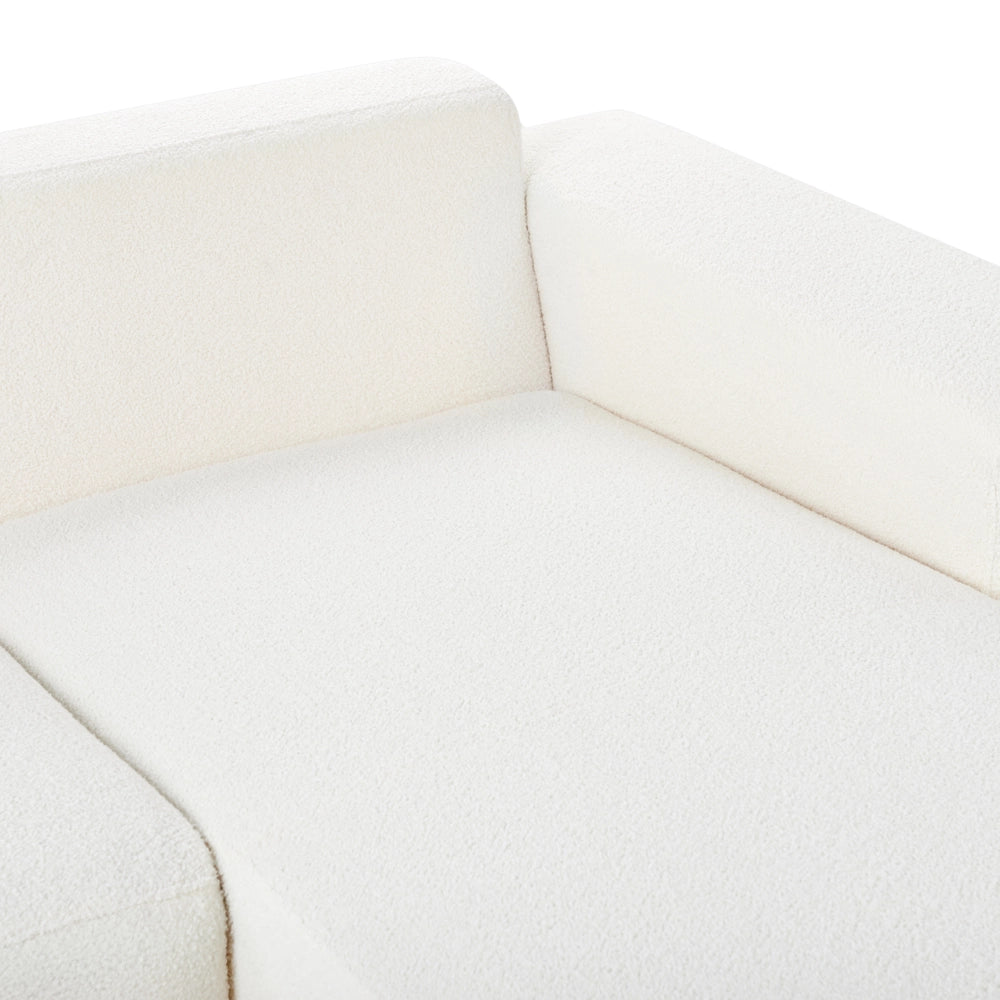 Divano angolare 4 posti in tessuto bouclè bianco lato sinistro forma a L stile elegante