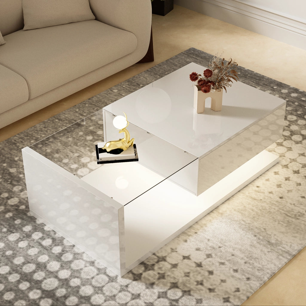 Tavolino da salotto 105x55x32.5 cm; piano in vetro temperato con LED regolabili; pannello truciolare bianco
