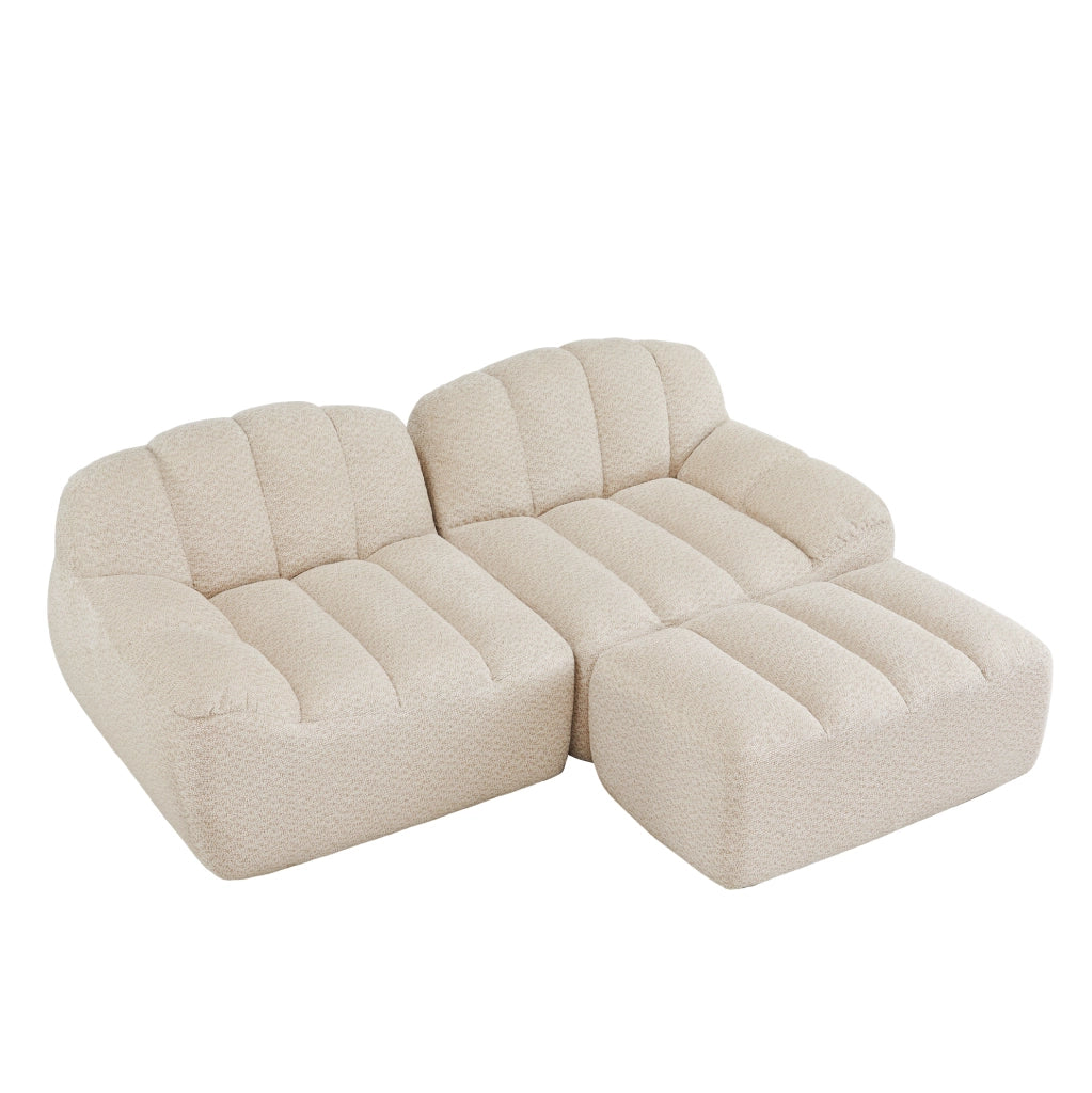 Divano modulare angolare 210.0x165.0x79.0 cm con ottoman senza montaggio in pile granulato beige e bianco