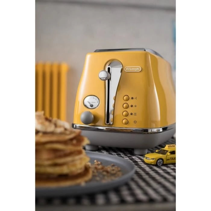 DELONGHI ICONA CAPITALS Tostapane 2 fette - 900W - Tostapane 3 funzioni - Scaldapasta incluso - Giallo