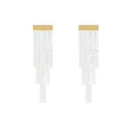 Orecchini vintage con nappe a forma di conchiglia.