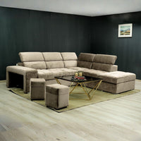 Divano angolare reversibile Positano cappuccino con poggiatesta regolabili, pouf e funzione letto