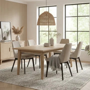 Set di 4 sedie da pranzo imbottite in tessuto beige Erythea con struttura in metallo facili da pulire | Duzzle
