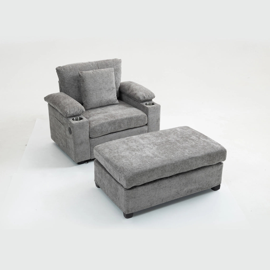 Poltrona reclinabile in chenille grigia con portabicchieri e vani laterali, con cuscino schienale e cuscino decorativo