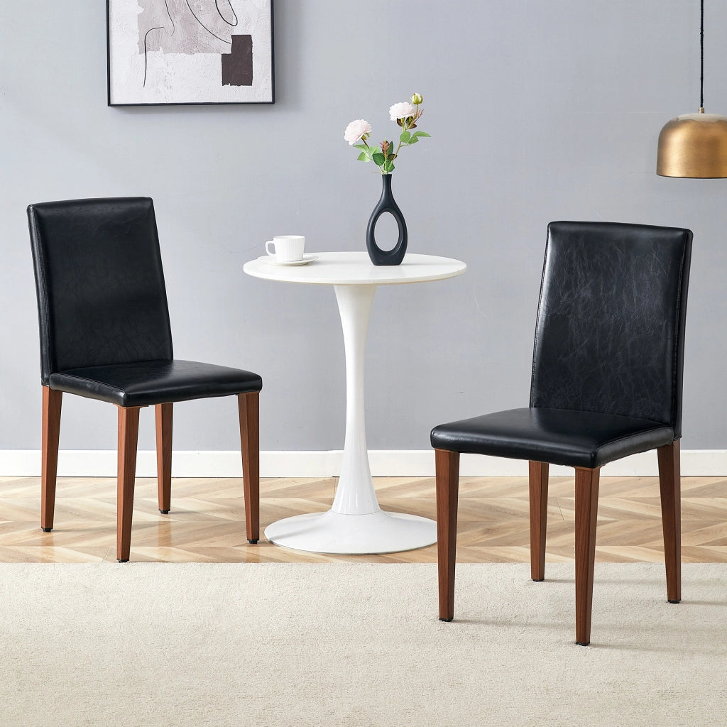 Sedia da pranzo 2 posti con schienale ergonomico e gambe in metallo effetto noce in PU nero