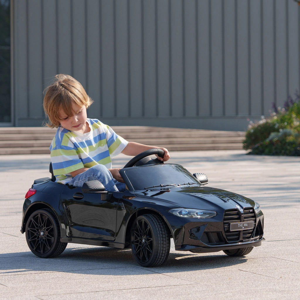 Auto Elettrica BMW M4 Bambini ¨C Xylo ¨C Con Telecomando, Clacson, Fari, 108x69.5x51 cm, Nera