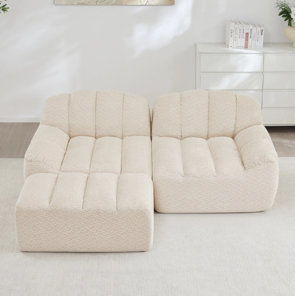 Divano modulare angolare 210.0x165.0x79.0 cm con ottoman senza montaggio in pile granulato beige e bianco