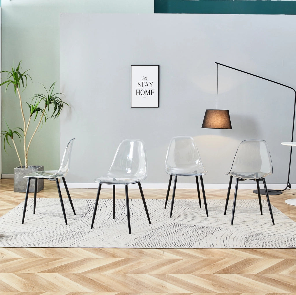 Set 4 sedie da pranzo in plastica trasparente con gambe in metallo nero