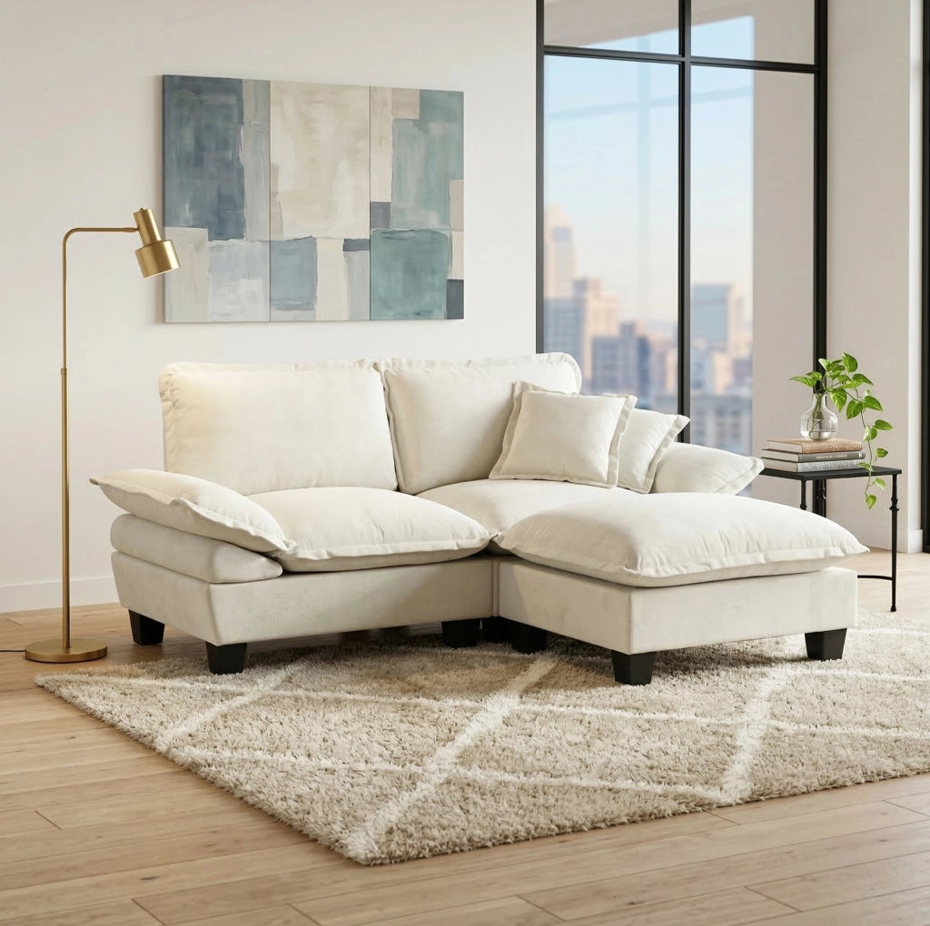 Divano angolare modulare Cloud in chenille beige con pouf mobile e 2 cuscini morbidi, 194x155x90 cm
