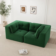 Divano angolare modulare senza struttura, rivestito in corduroy verde, con seduta profonda e comfort soffice
