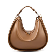 Borsa da donna alla moda in vera pelle, colore marrone.