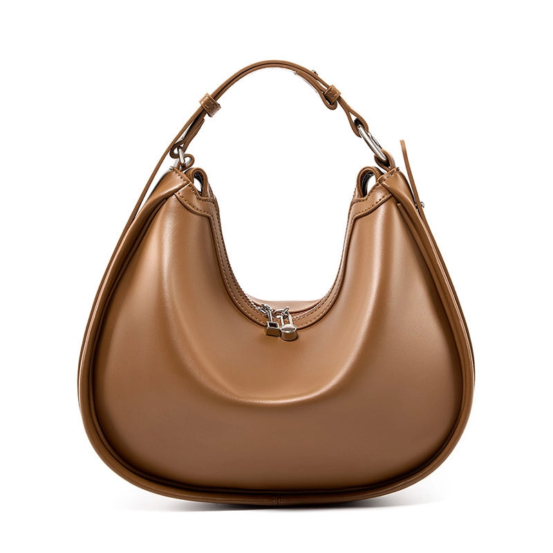 Borsa da donna alla moda in vera pelle, colore marrone.