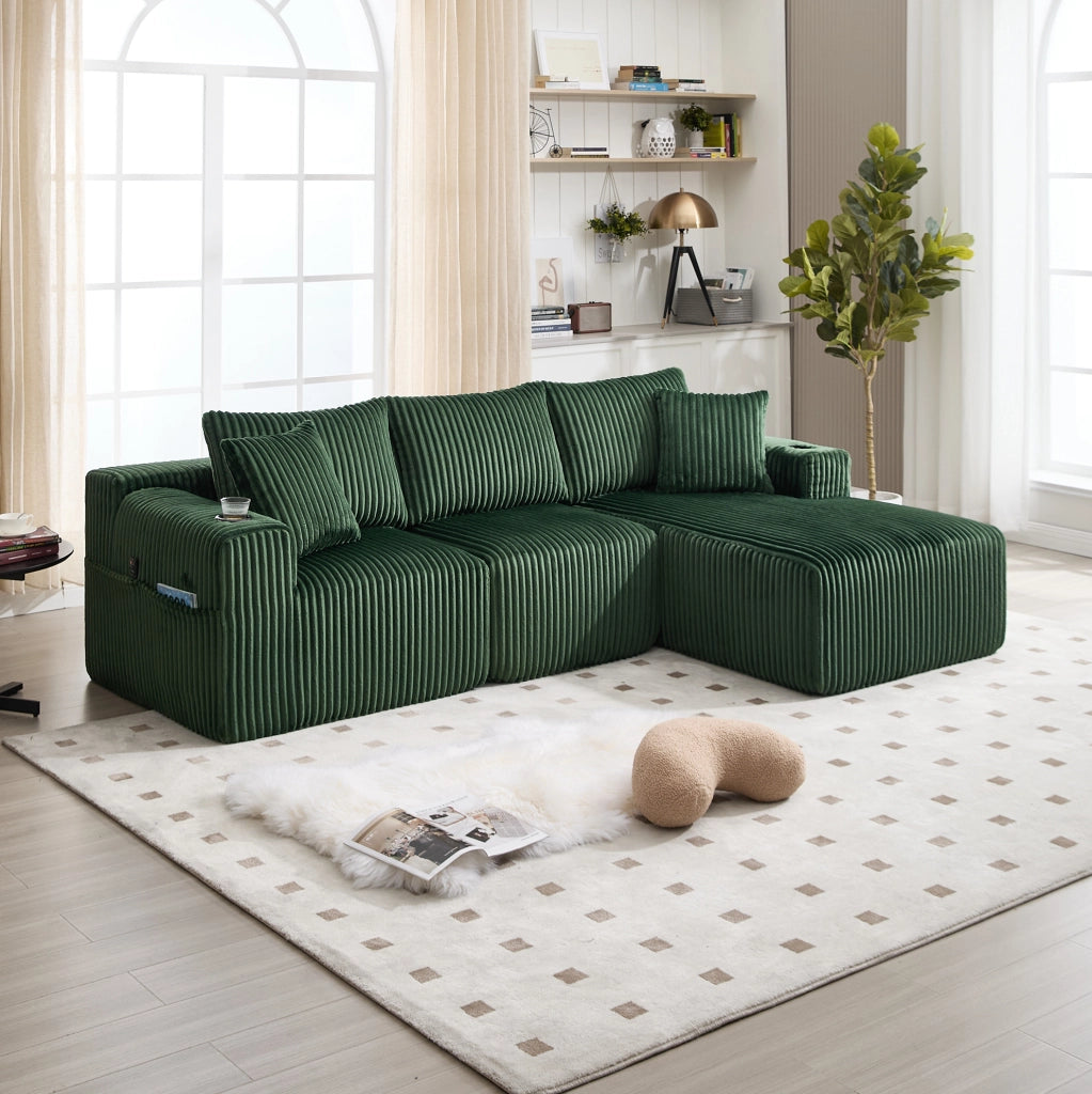 Divano modulare ULEVR con chaise longue e 2 posti, 5 cuscini, portabevande e tasche laterali, velluto a coste verde smeraldo