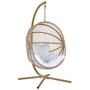 Poltrona sospesa in rattan naturale con base in metallo da interno e da esterno stile boho