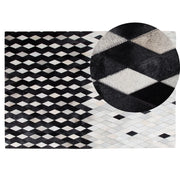 Tappeto Bianco e Nero in Pelle 140 x 200 cm Moderno Patchwork Fatto a Mano