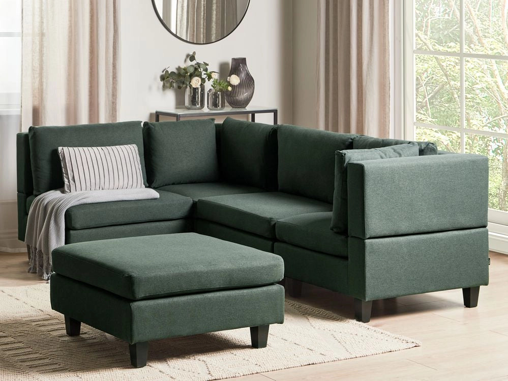 Divano componibile a 4 posti imbottito in tessuto verde scuro gambe nere lato destro con ottomana stile moderno