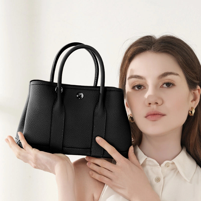 Borsa a mano e a tracolla da donna in vera pelle nera