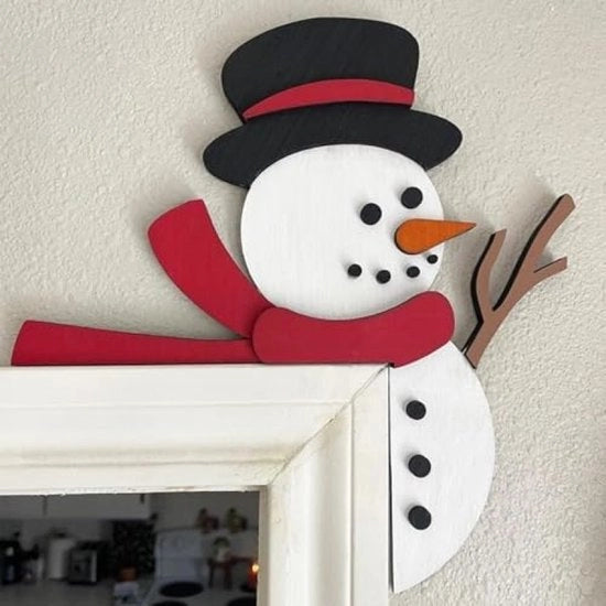 Decorazione di Natale per la porta con pupazzo di legno di neve