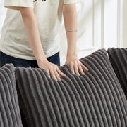 Divano modulare in velluto a coste con schienale e braccioli curvi, completo di 2 cuscini
