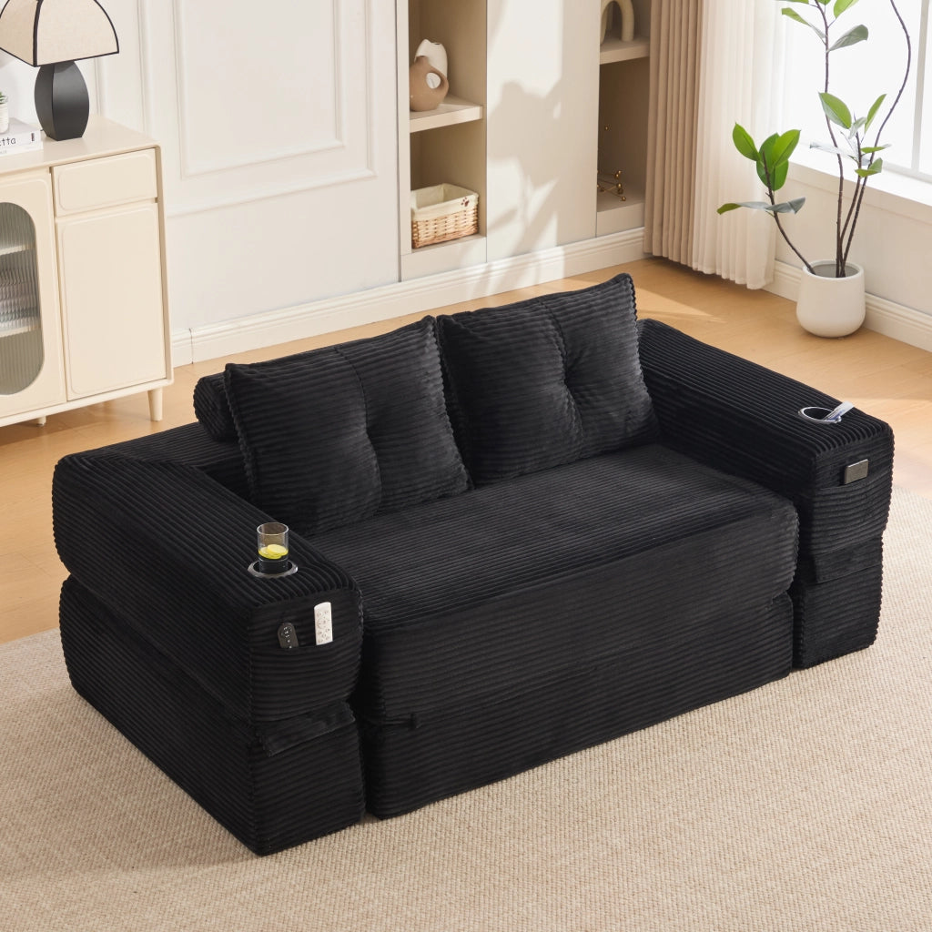 Divano convertibile 2 posti in corduroy con cuscini memory, tasche laterali e portabicchieri nero