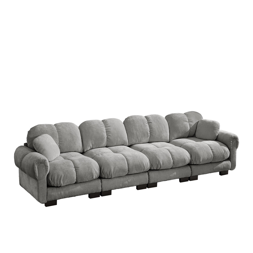 Divano modulare 4 posti con cuciture trapuntate e cuscino lombare in chenille grigio chiaro