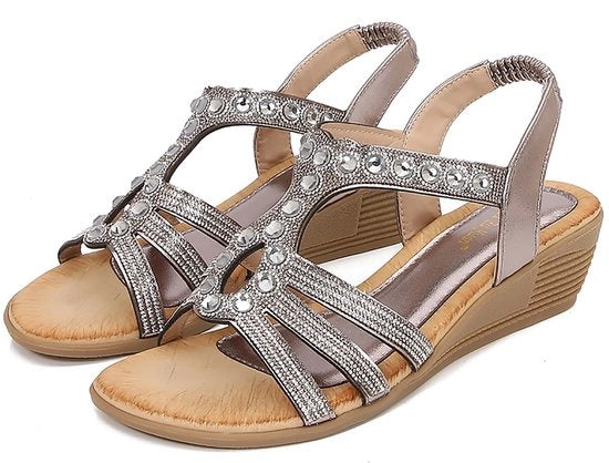 Sandali da donna estivi con decorazioni strass, tacco basso e laccetto elastico, con comfort e forma rotonda.