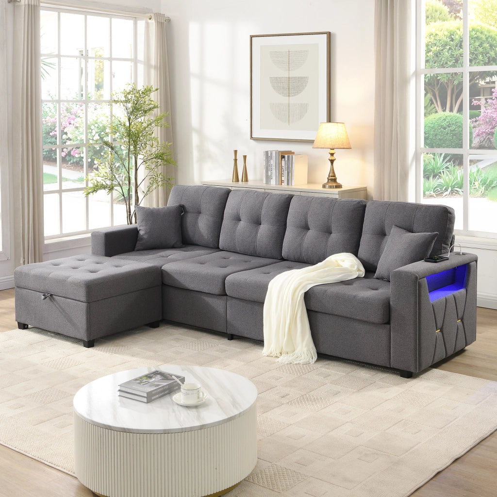 Divano modulare angolare 4 posti - con pouf contenitore; LED e porte USB - in lino - grigio antico
