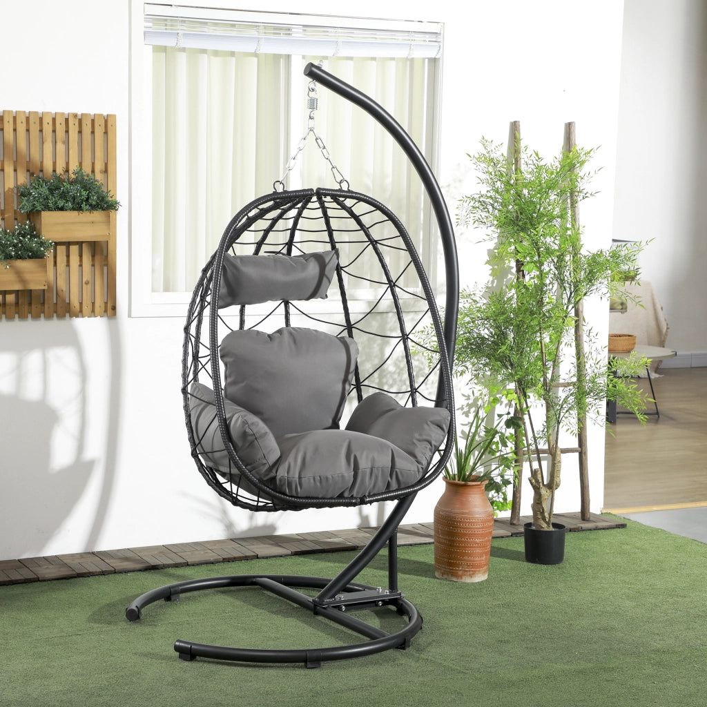 Poltrona sospesa in rattan con struttura in acciaio, cuscini e copertura impermeabile, nero