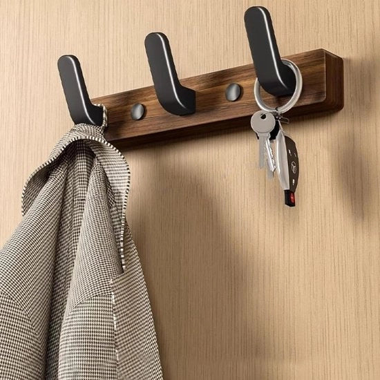Capocassettiera a muro - moderno chiodo da cappotto - hanger in legno - walnoot - maniglioni decorativi - appoggiatestine - guardaroba - adatto per corridoio o ingresso - modello in legno scuro.