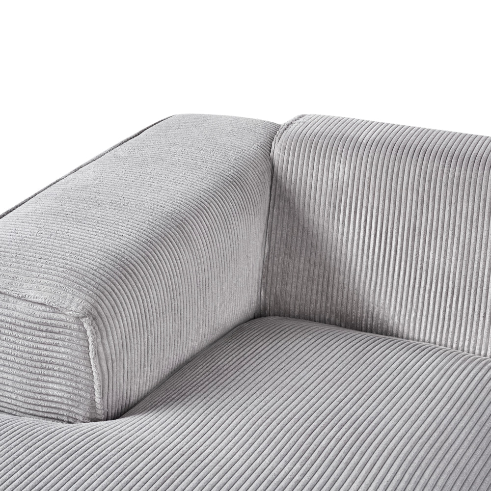 Divano Angolare lato destro in velluto a coste grigio chiaro con cuscini decorativi stile Moderno