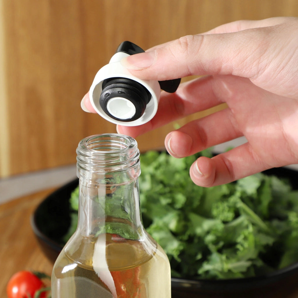 Bottiglia in vetro KADAX per olio d'oliva con dosatore da 250 ml.