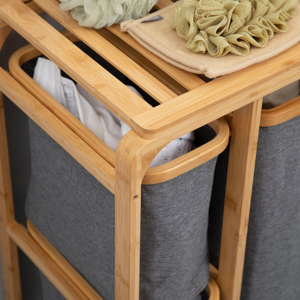 Cesta portabiancheria 50x32x69.7 cm con 3 sacchi rimovibili; struttura in bambù; naturale