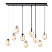 Lampada a sospensione Astral con nove diffusori in vetro ambra