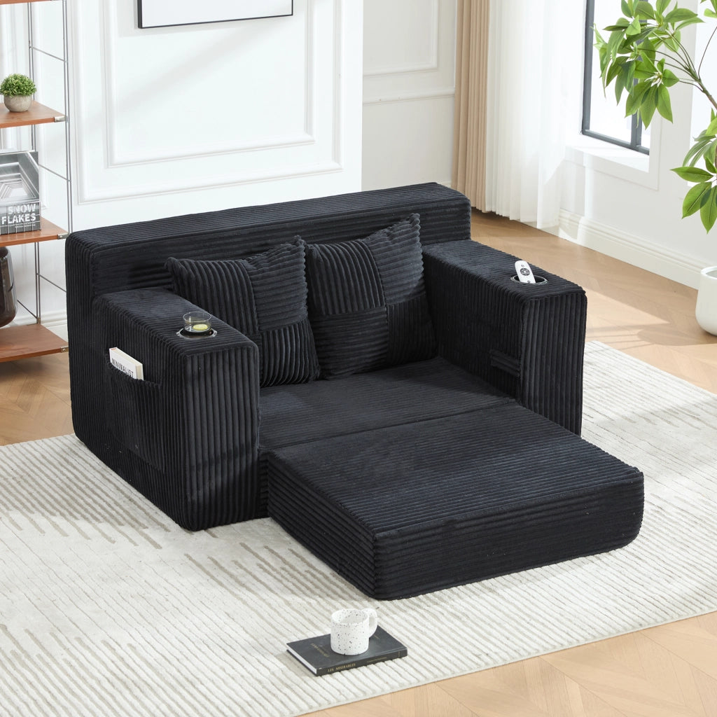 Pouf divano in velluto a coste nero 151x133x64 cm con tasche laterali e 2 cuscini