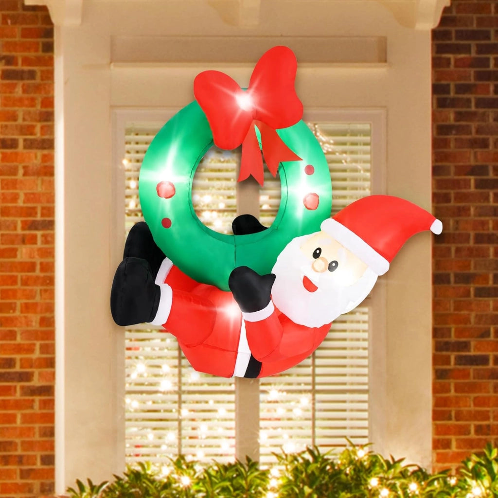 Decorazione Gonfiabile di Natale 120 CM, Babbo Natale Illuminato e Corona con Fiocco Rosso, 5 Luci LED, Soffiatore e 2 Corde, per Prato, Casa, Festa